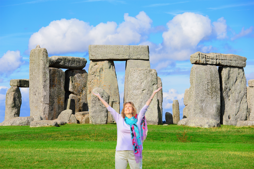 Julie standing in front of Stonehenge.